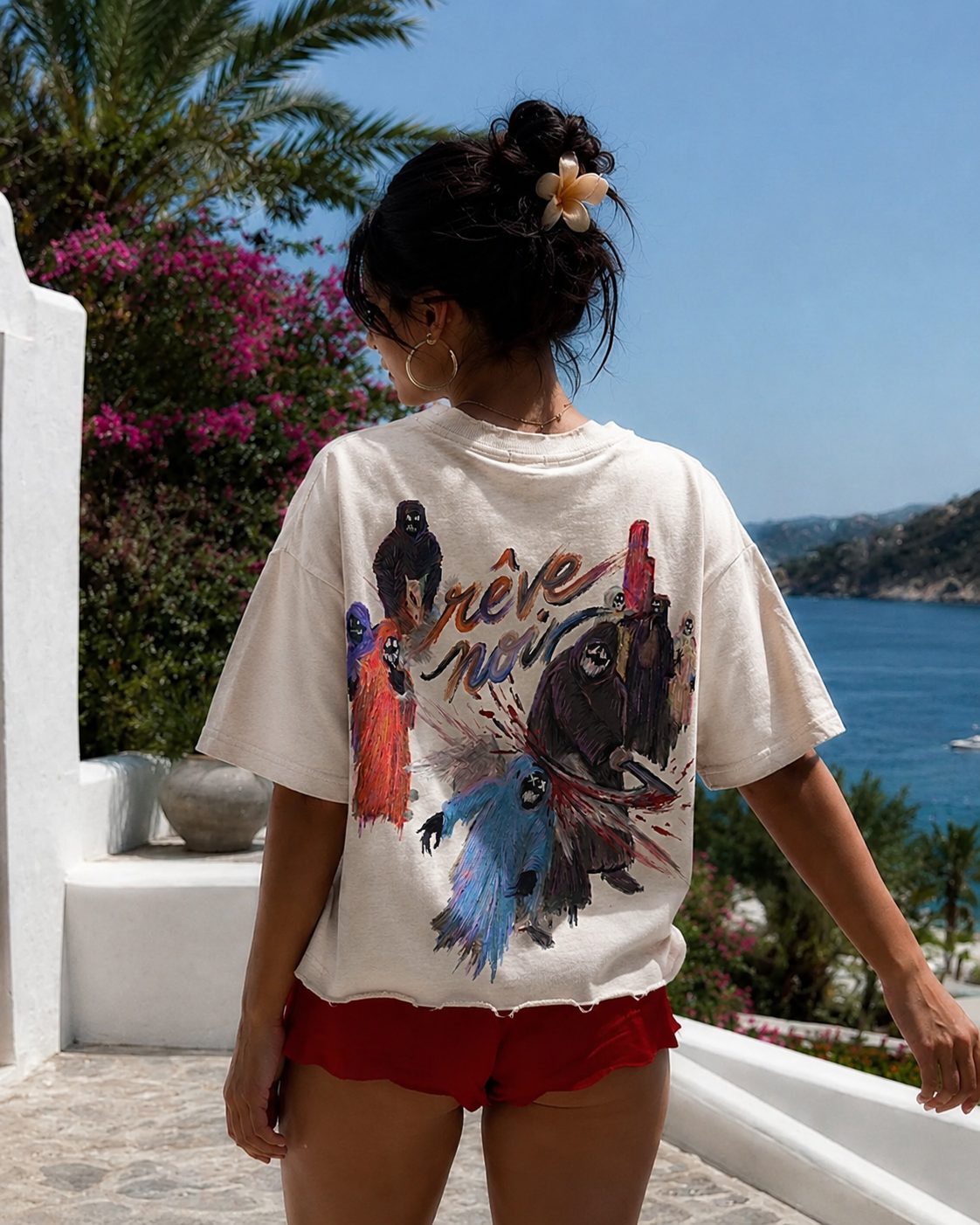 Friends & Foes tee worn on a Mediterranean terrace